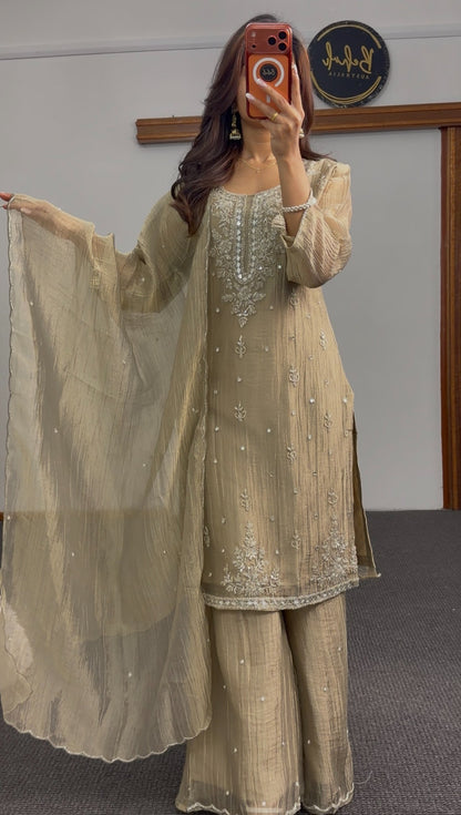 Sage green palazzo suit set with mirror work and floral embroidery, worn with matching dupatta — Behuli Australia