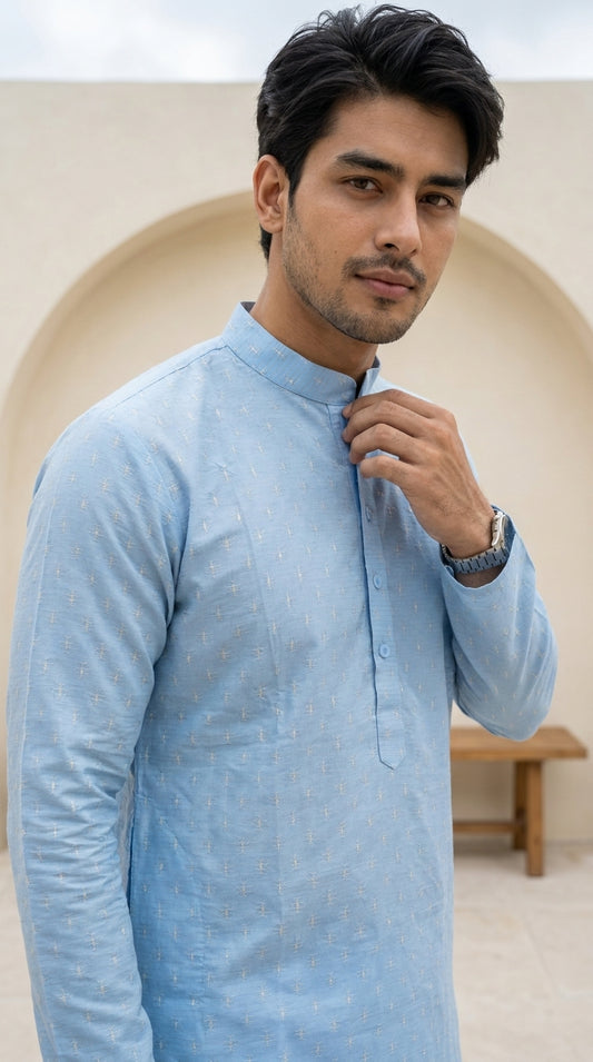 Powder blue men's kurti with mandarin collar, button placket, and subtle woven motif pattern paired with cream trousers — view 2