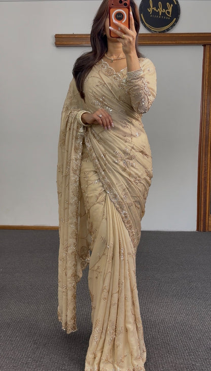 Ivory saree with gold floral embroidery and sequin detailing, draped with matching embellished pallu — Behuli Australia — view 2