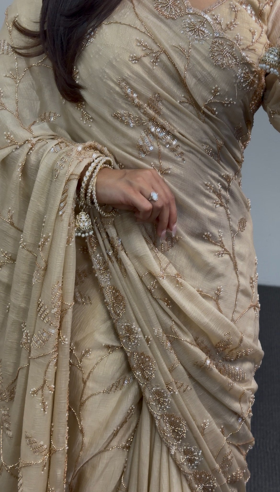 Ivory saree with gold floral embroidery and sequin detailing, draped with matching embellished pallu — Behuli Australia — view 3