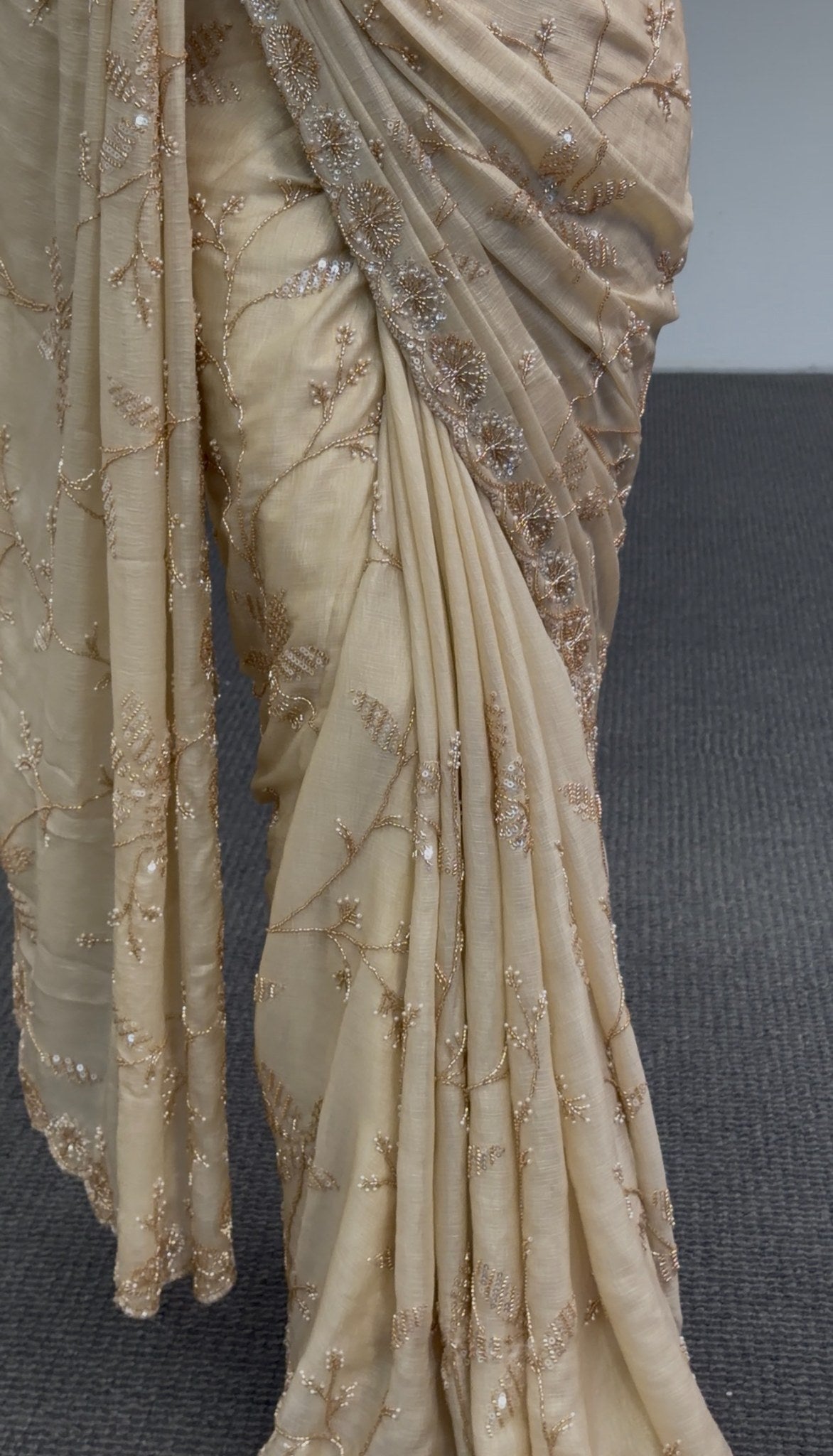 Ivory saree with gold floral embroidery and sequin detailing, draped with matching embellished pallu — Behuli Australia — view 4