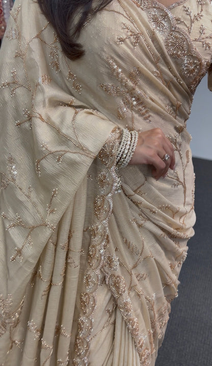 Ivory saree with gold floral embroidery and sequin detailing, draped with matching embellished pallu — Behuli Australia — view 5